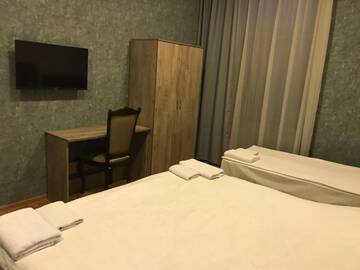 Фото номера Четырехместный номер Делюкс Отели типа «постель и завтрак» Kamar Hotel Ijevan г. Иджеван 3