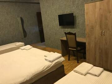 Фото номера Четырехместный номер Делюкс Отели типа «постель и завтрак» Kamar Hotel Ijevan г. Иджеван 8