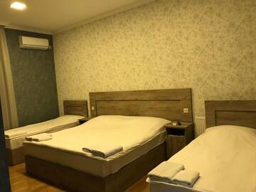 Фото номера Четырехместный номер Делюкс Отели типа «постель и завтрак» Kamar Hotel Ijevan г. Иджеван 4