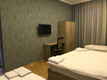 Фото номера Четырехместный номер Делюкс Отели типа «постель и завтрак» Kamar Hotel Ijevan г. Иджеван 9
